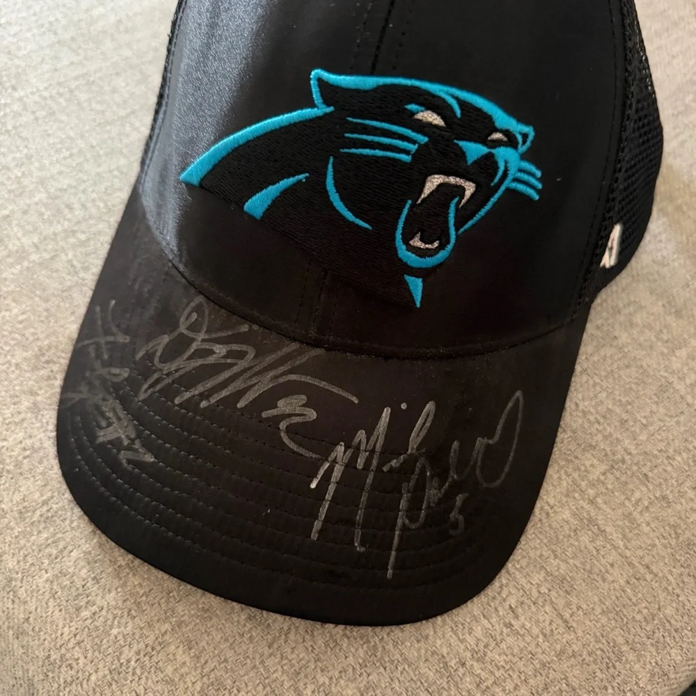 North Carolina NC Panthers Black Trucker Hat with Teal Logo 47 signed autograph